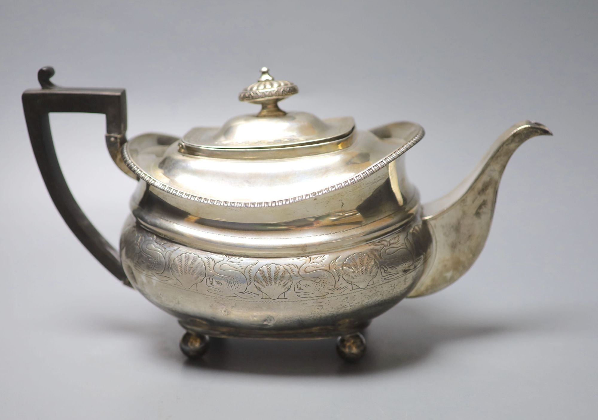 A George III silver ovoid teapot, London, 1813, gross 18oz,